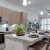 a kitchen with a table and chairs