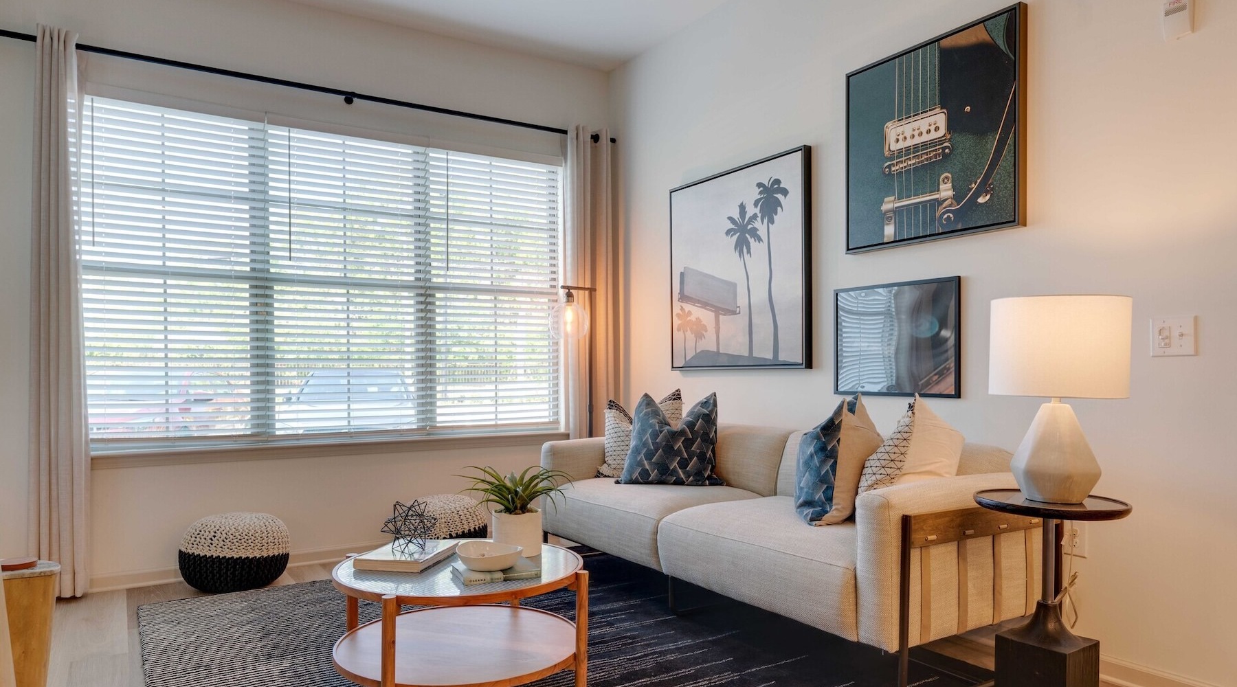 Spacious living areas to relax and unwind living room with a large window and open spaces