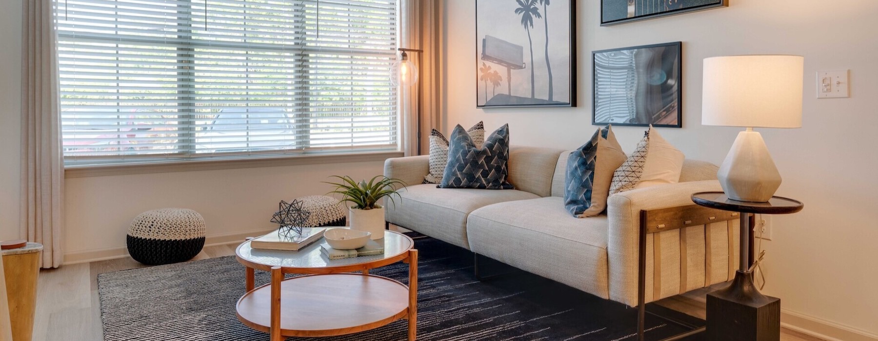 living room with a large window and open spaces